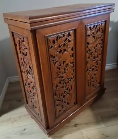 Hand Carved Asian bar on wheels