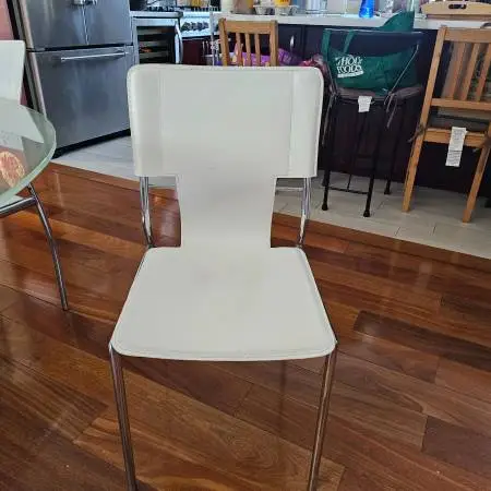 Four White Dinner Chairs