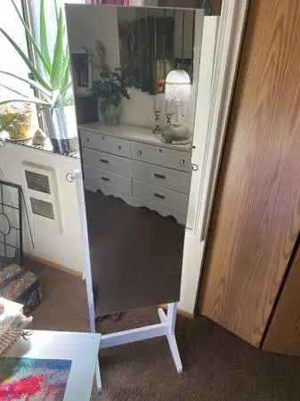 Jewelry cabinet mirror
