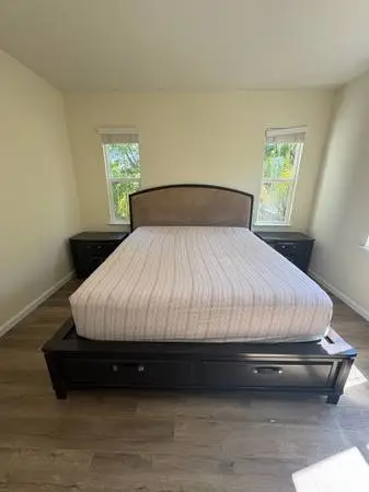 Ashley Cal-King Bedroom Set - Bed Frame with Storage and 2 Nightstands