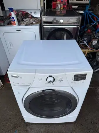 White whirlpool front load washer clean good working condition free de