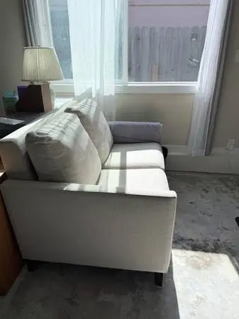 Two seater loveseat couch by American Leather