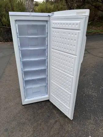 11 cubic upright freezer (free local delivery)