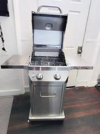 New. NexGrill 2 Burner Stainless Steel Propane Gas Grill with Folding Side Shelv