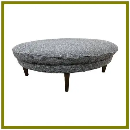 Mitchell Gold & Bob William Terence Ottoman. Estimated Cost: $1,200