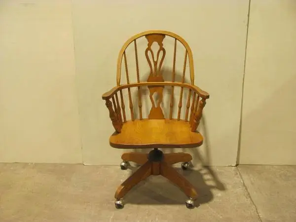 Windsor style light oak swivel office chair with arms on casters