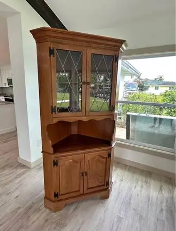 Ethan Allen Early American corner china cabinet. Solid map...