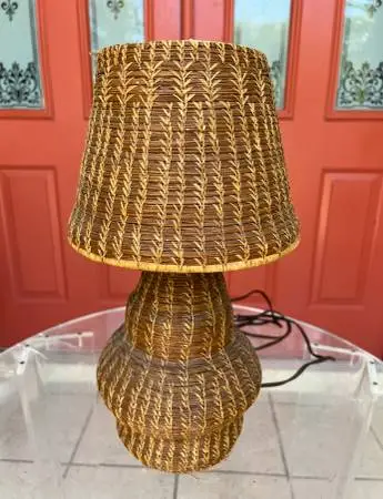 Vintage woven pine needle table lamp on white house vinegar bottle