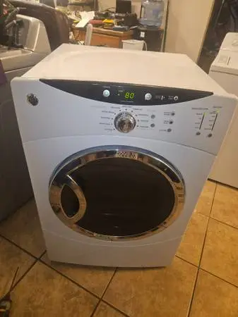 27 Stackable GE dryer, electric, new glides & door latch/strike