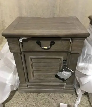 Brand new pair of Ashley Furniture nightstands with USB