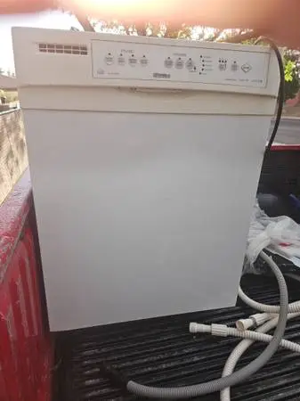 24 Kenmore white dishwasher, clean inside, all works, plastic tub