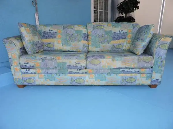 Tropical Looking Sofa Bed With Pillows. Multicolor With Pull Out Bed