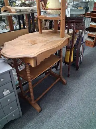 Half moon table with drawer, shelf and decorative legs