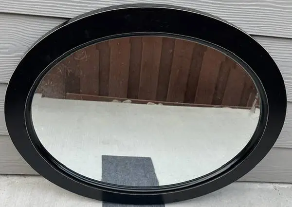Black Oval Mirror (24x30) $25. Brown Rectangular Mirror (23x29) $20.