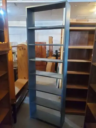 Blue solid wood tall bookshelf