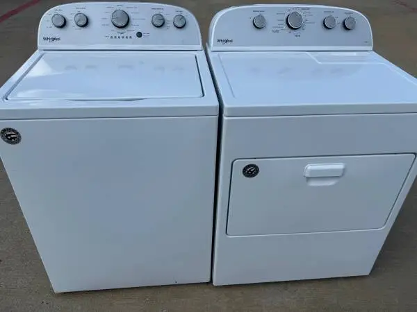 Silver panel Whirlpool washer and Whirlpool dryer electric