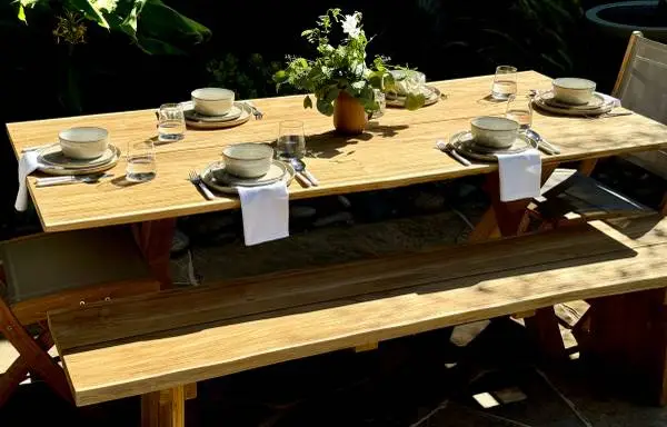 Live Edge solid teak outdoor tables and benches. Locally made !