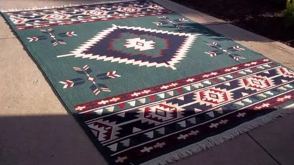Carpet 130 x 92 with 2 Throw rugs.