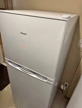 GE new re-frigerator... 12cft perfect cond