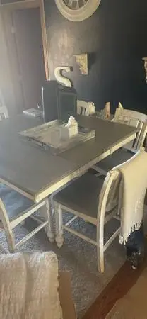 Large wood farmhouse table with 6 chairs