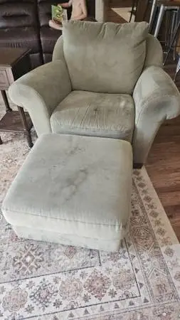 Green living room chair with ottoman