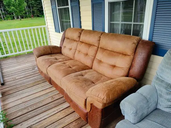 Couch with built in recliners.