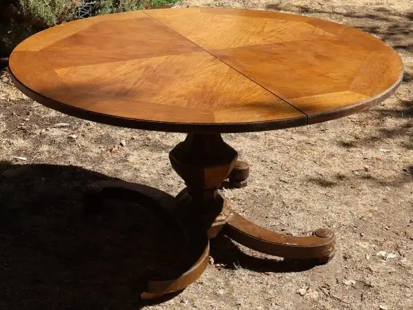 50 Round Dining Table with two 12 Leaves Table is 27 tall in CHICO
