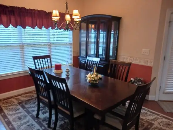 MAHOGANY DINING TABLE AND CHAIRS