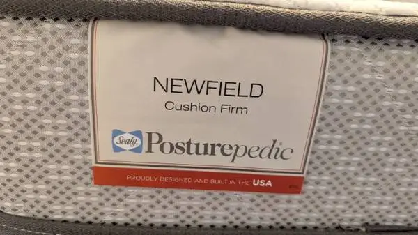 Like-new Sealy queen mattress set (box spring and frame included)