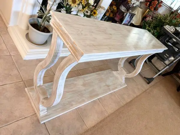 Hand - carved cream mango wood console table.