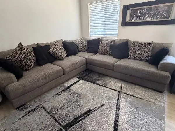 Couch 12 pillows 2 end tables 1 lamp