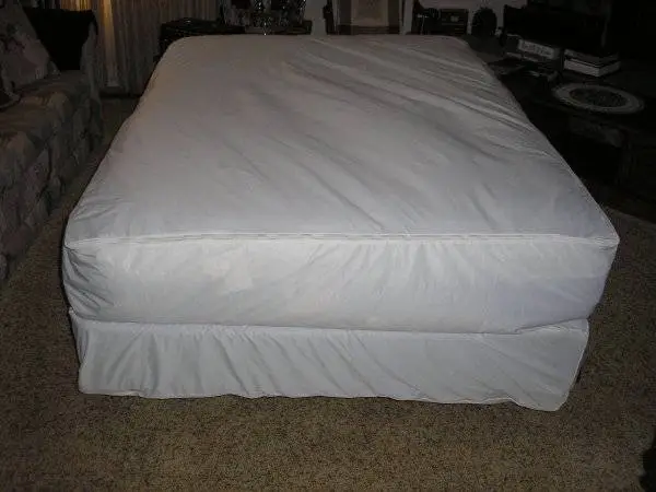 Full size bed with bedding