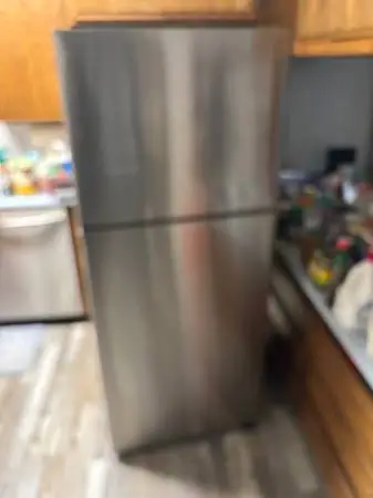 Stainless steel refrigerator will deliver and install
