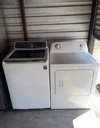 White Samsung Washer And Amana Electric Dryer