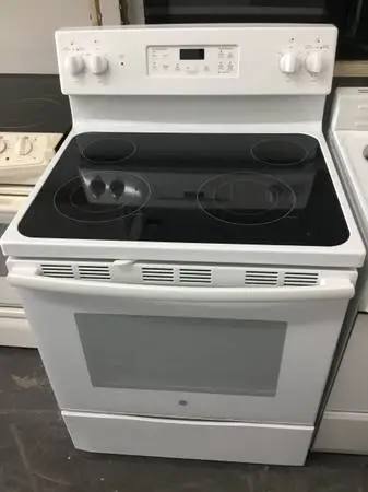 White GE glasstop range
