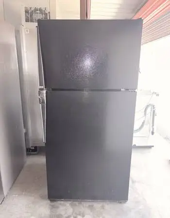 Black Amana Refrigerator And Freezer