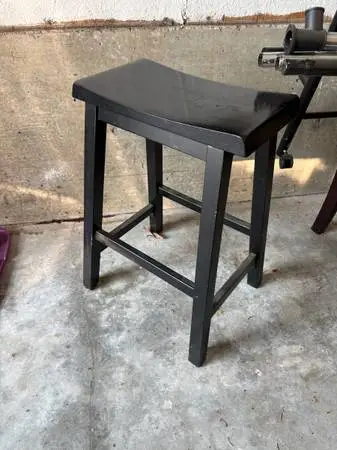 Black wooden stool