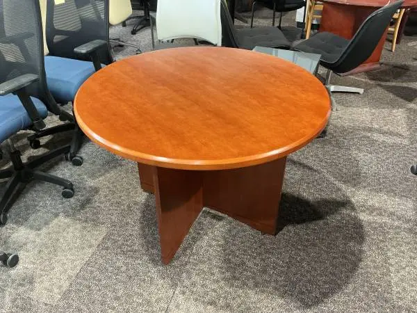 42 round wood conference table by Gunlocke in Cherry finish