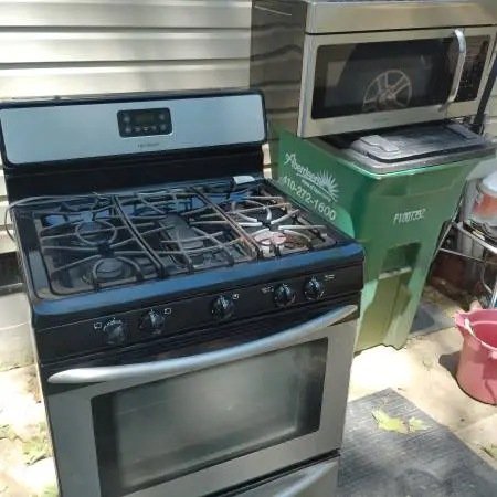 Frigidaire 5 burner gas stove and microwave, $375