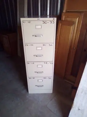 White 4 drawer legal size file cabinet