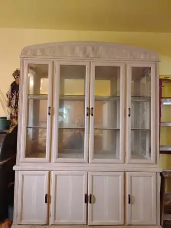 Beige dining room hutch working lights