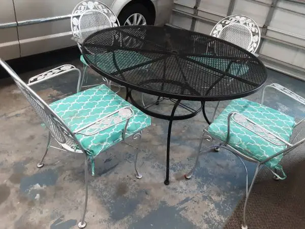 Wrought Iron Table, 4 Chairs, Cushions and Umbrella Stand Base