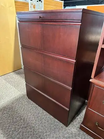 4Dr 31 3/4Wx2Dx52H lateral file cabinet in Mahogany wood finish w/
