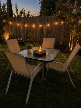 Patio set with tabletop fireplace