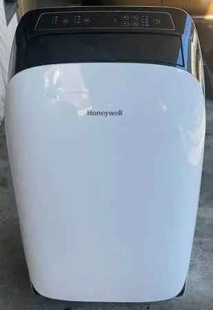 Honeywell Portable Air Conditioner with built in dehumidifier option  HL10CESWW