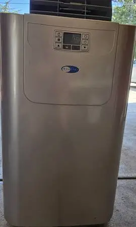 Portable air conditioner brand is whynter dual output 12000 BTU use the handful