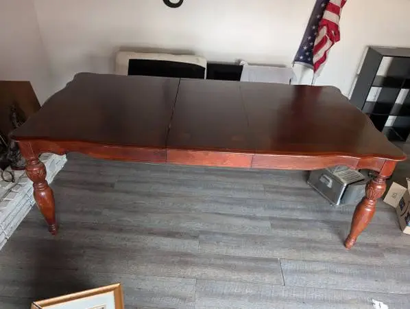 French Provincial extension dining table or a Queen Anne style dining table.