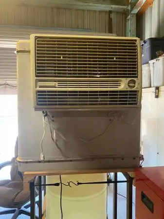 Evaporative cooler on wheels for shop or patio.