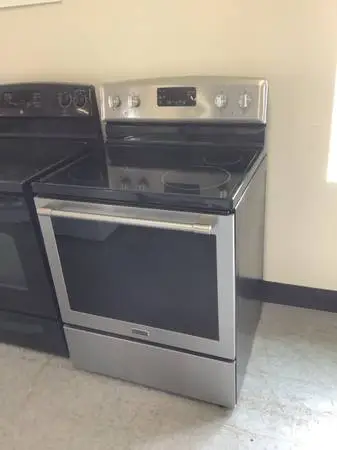 Maytag glass top electric stove.