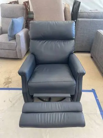 Leather Recliner Rocks and swivels